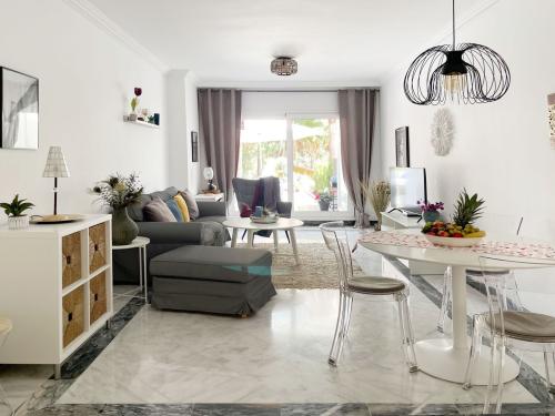 Living and dining area with access to the terrace