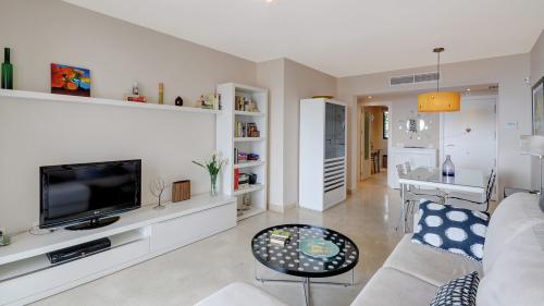 Living area with TV and dining table