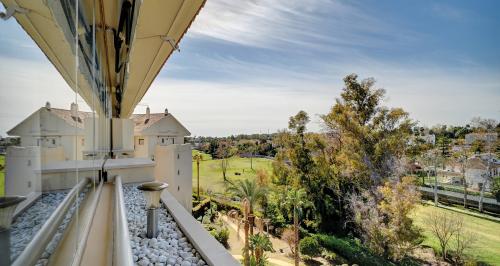 Terrassenblick über die Gartenanlage in Richtung Golfplatz